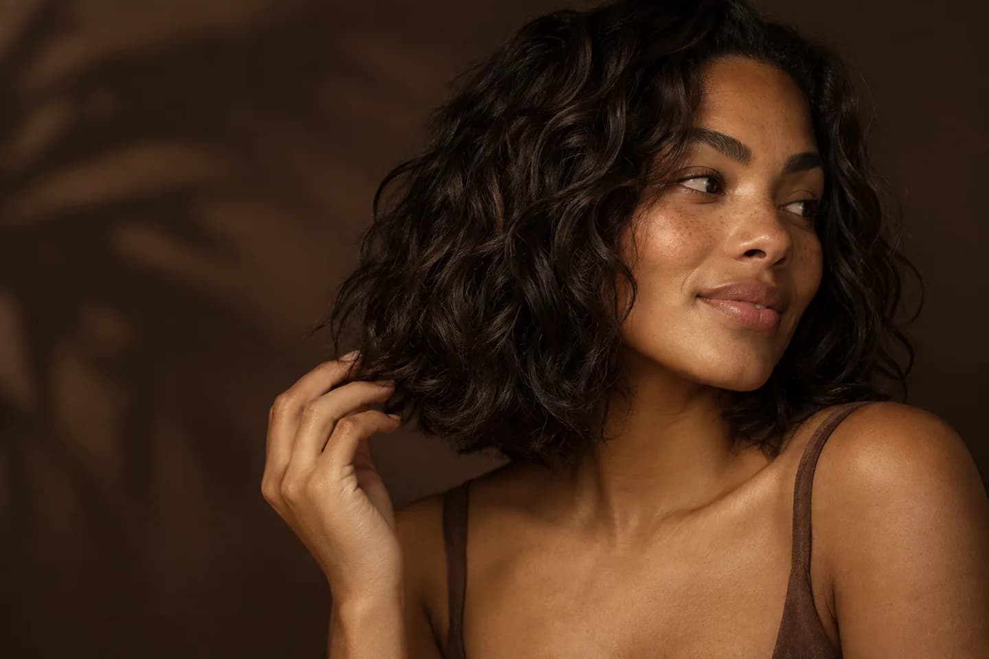 Woman with a textured shoulder-length bob